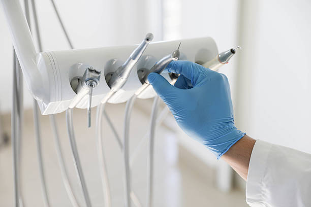 Professional Tooth Extraction technician working in George Mason, VA